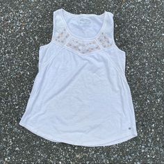 Eddie Bauer Embroidered Tank Top Size Tall Large! In Brand New Condition Color Is Off White With Light Color Embroidery Around Neckline! Super Cute Summer Top! White Tops With Machine Embroidery For Spring, White Machine Embroidered Tops For Spring, White Cotton Top With Embroidered Hem, White Cotton Embroidered Top With Embroidered Hem, White Cotton Embroidered Top With Hem Detail, White Casual Top With Embroidered Neckline, Casual White Tops With Embroidered Neckline, Casual White Top With Embroidered Neckline, Casual Cotton Top With Machine Embroidery