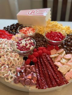 a platter filled with lots of different types of candy