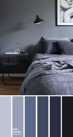 a bedroom with gray walls and grey bedding