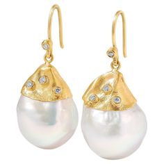 Large, White, 54ct Baroque Pearl Earrings with Diamonds, in 24kt Gold by Prehistoric Works of Istanbul, Turkey. Length: 34mm (1.4"); Width: 15.5mm (.6"). Throughout the centuries, pearls have been associated with wealth, femininity, purity, wisdom, patience and peace. Due to their appearance, they have often been compared to the moon, and are said to have a calming, protective and strengthening effect on the wearer. It is also the birthstone for the month of June. Yellow Gold Baroque Pearl Earrings, Yellow Gold Baroque Pearl Pendant Earrings, Pear-shaped Baroque Pearl Earrings In Yellow Gold, Yellow Gold Baroque Pearl Charm Earrings, White Baroque Pearl Earrings, Round Shape, Month Of June, Baroque Pearl Earrings, Pearl And Diamond Earrings, 24kt Gold