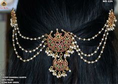 a close up of a woman's hair wearing a head piece with pearls on it