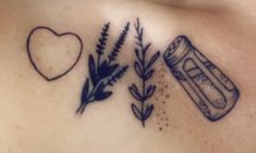 a tattoo on the chest with herbs and a heart next to it that says i love you