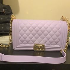 This Bag Is Never Used. It’s A Beautiful Bag. It Is A Plasticy Material. Chic Lavender Shoulder Bag, Chic Purple Shoulder Bag, Chic Purple Crossbody Bag, Chic Lavender Crossbody Shoulder Bag, Chic Lavender Rectangular Shoulder Bag, Chic Purple Shoulder Bag For Shopping, Lavender Quilt, Purple Lavender, Cute Purses