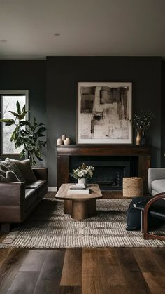 a living room with two couches and a coffee table in front of a fireplace