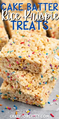 three pieces of cake batter rice krispy treats stacked on top of each other with sprinkles