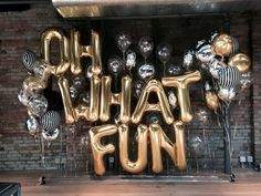 an image of balloons that say oh what fun