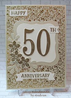 a 50th anniversary card with flowers on it