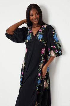 The dress features a premium embroidered floral design which is hand sketched in house by our talented design team. With its pop of colour, this dress is ideal for creating a stunning summer look. The puff sleeves add a trendy and playful element to the overall design while the cut-out detail at the back keeps the style modern and elegant. Made from premium voile fabric, this dress not only offers a slight sheen but also ensures a luxurious and comfortable fit. Floral Evening Dresses, Leather Jacket Dress, Puff Sleeve Midi Dress, Work Wear Outfits, Voile Fabric, Oasis Fashion, Floral Shirt Dress, Dresses Floral, Tshirt Skirt