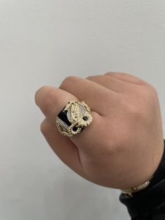 14K Onyx Snake and Eagle CZ Ring  -Solid 14K REAL Gold !! -Very nice Snake and Eagle Onyx ring with red eye cz  -The design includes cz stones  -Great gift for both male and female!! -Available in a size 10 US  -(message us if you have any other questions) -item sold by piece. Weight undetermined. - Once rings are personalized to a specific size it is final sale. Luxury Diamond Signet Ring Collectible, 14k Gold Ring With Diamond Eyes, Luxury Cubic Zirconia Ring With Polished Finish, Luxury Cubic Zirconia Signet Ring With Polished Finish, Luxury Diamond Eyes Rings For Anniversary, Luxury Anniversary Rings With Diamond Eyes, Luxury Gold Plated Rings With Diamond Accents, Luxury Gold-plated Rings With Diamond Accents, Luxury 14k Gold Collectible Rings