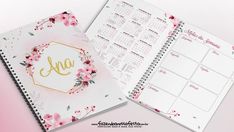 an open planner with flowers on it and the word ann written in gold foil lettering