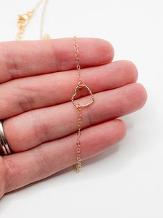 Handmade in Portland, Oregon. The perfect dainty necklace to elevate your look. MEASUREMENTS + MATERIALS - Length coming in 16 or 18 inches and is adjustable to the right length for you - The perfect accent to add sparkle to any outfit! - Heart charm is about 10mm wide - Heart and chain are gold fill for sensitive skin (hypoallergenic) - Won't turn green because it's GOLD FILL! WHAT PEOPLE SAY “Beautiful craftsmanship, these were for my mother in law, she loves them. I love supporting small busi