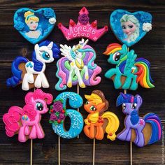 there are many decorated cookies that look like little pony's and princess ponies