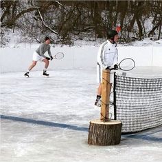 two men playing tennis in the snow with caption that reads real canadians make other games more interesting