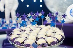 a dessert plate with cupcakes and stars on it