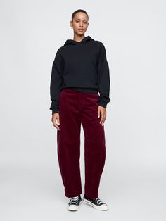 Soft corduroy tapered trousers.  Concealed hook and bar closure, zip fly.  Front slant pockets, back welt pockets.  Fit: Classic.  An easy silhouette that fits close at the waist, and is relaxed through the hips and thigh.  High rise.  Tapered leg.  Models wearing Gap Ankle Trousers, Easy Silhouette, Brand Collaboration, Tapered Trousers, Toddler Gifts, Thigh High, Online Shopping Clothes, Welt Pockets, Tapered Legs