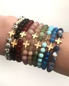 These minimalist cross bracelets are handcrafted using genuine 6mm gemstones strung on high quality stretch cord. Each bracelet features an 18K gold plated cross and bead.  They come in a variety of colors (gemstones) and make a wonderful gift for any occasion.  Olive Us Designs is committed to making quality jewelry that is both beautiful and meaningful. We do our best to represent the color and size of each item; however, please note that colors can appear different from device to device due to resolution, pixels, & RBG color. Additionally, since most of our items are crafted with natural gemstones, some variations may occur from bracelet to bracelet. We stand behind our designs so if you have any questions or concerns please message or contact us at oliveusdesignsco@gmail.com.   Please Adjustable Cross Jewelry With Natural Stones, Adjustable Cross-shaped Jewelry With Natural Stones, Adjustable Cross Stretch Bracelet As Gift, Cross Bracelets, Catholic Bracelet, Womens Gifts, Teacher Craft, Keychain Craft, Christian Bracelets