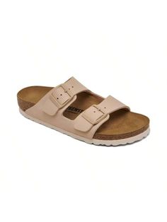 The classic Birkenstock silhouette is back and better than ever on the Birkenstock Women's Arizona Birko-Flor Soft Footbed Sandals. Featuring a two-strap design with buckles and a ooth, synthetic nubuck-like Birko-Flor upper, these sandals offerfort that lasts. 
Athletic casual sandals 
Birko-Flor Nubuck upper 
Suede footbed lining 
Cork-latex footbed is anatomicy shaped 
Eva foam sole 
Adjustable metal pin buckles at each strap 
Style no. 1027723 
Synthetic upper; Rubber sole 
Wipe Clean 
Impor Birkenstock Women, Footbed Sandals, Metal Pins, Womens Sandals Flat, Strap Design, Eva Foam, Casual Sandals, Finish Line, Flat Sandals