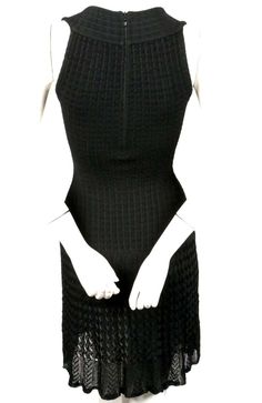 For Sale on 1stDibs - Jet black knit wool dress with semi sheer crochet detail designed by Azzedine Alaia dating to the 1990's. Labeled a size XS. Measures approximately (unstretched): Fitted Knit Mini Dress For Evening, Elegant Party Crochet Dress, Elegant Fitted Sleeveless Crochet Dress, Elegant Crochet Dress For Party, Elegant Crochet Party Dress, Fitted Black Knit Dress, Elegant Fitted Crochet Dress With Pointelle Knit, Elegant Fitted Crochet Knit Dress, Fitted High Neck Knit Dress