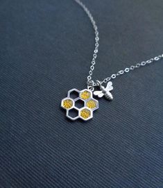 Honeycomb Bee Necklace in Silver or Gold Beehive Pendant | Etsy Silver Enamel Jewelry With Adjustable Chain, Personalized Silver Charm Necklace With Enamel, Personalized Silver Enamel Charm Necklace, Silver Enamel Pendant Charm Necklaces, Personalized Silver Charm Necklace In Enamel, Silver Enamel Charm Necklace For Gift, Hexagon-shaped Silver Jewelry For Gift, Handmade Hexagonal Silver Jewelry, Silver Hexagon Necklace For Jewelry Making