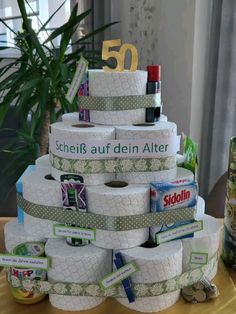 a stack of rolls of toilet paper sitting on top of a table