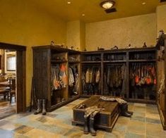 the inside of a large room with lots of closets