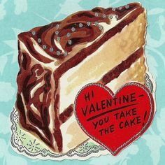 a piece of cake with chocolate icing and hearts on the side that says h'valentine - you take the cake