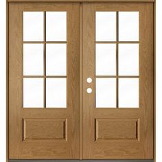 a double door with glass panels and sidelights