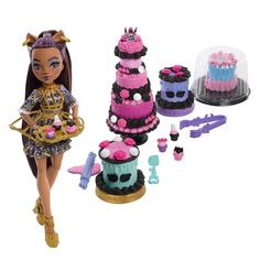 a doll and cake set with accessories on a white background