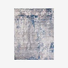 an abstract rug with grey and white colors