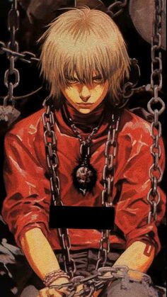 an anime character with chains around his neck and hands in front of him, looking down at the ground