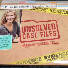 a cardboard box with tape around it that says unsolved case files on the front