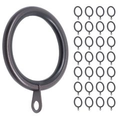 an assortment of metal rings and hooks on a white background