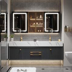 a bathroom with two sinks and mirrors on the wall