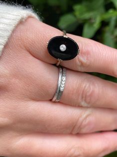 ~ Here we have a beautiful early 20th century ring set with a black onyx and diamond  ~ In great condition, light wear and patina in keeping with age and use. The main stone tests as black onyx, no chips or damage, set with a diamond, secure in bezel, nice and bright.  ~ Size measures as a U.K. K / US around 5.12  ~ Ring face is approximately 16.1mm north to south ~ Ring is unmarked as often seen in older pieces, tests as gold of 14ct  ~ Any questions or for more photos please feel free to messa Classic Black Diamond Ring With Black Enamel, Classic Enamel Ring With Gemstone, Classic Black Enamel Round Ring, Timeless Black Ring With Rose Cut Diamonds, Timeless Black Rings With Rose Cut Diamonds, Vintage Black Enamel Round Ring, Victorian Black Signet Ring Stamped 14k, Black Oval Enamel Ring For Formal Occasions, Formal Black Oval Enamel Ring