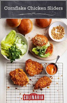 chicken patties with lettuce, tomato sauce and breaded buns on a cooling rack