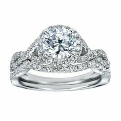 a white gold engagement ring set with diamonds