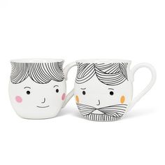 two mugs with faces painted on them