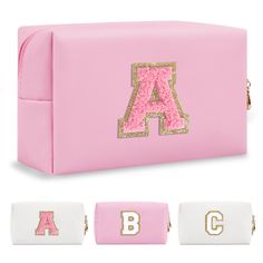 pink and white cosmetic bag with gold glitter letters on the front, along with two matching zippered pouches