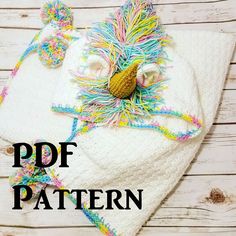 a crocheted hat with pom - pom on it and the text, free pattern