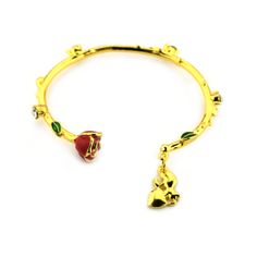 Feel the magic of the enchanted rose with this Beauty and the Beast inspired cuff. It features a delicate red rose with gold accents, rhinestones, and a Beauty and the Beast Charm Diameter: 2 1/2" Gold Tone Plating Metal/ Glass/ Rhinestones Slip-on Beauty And The Beast Quince, Beauty And The Beast Theme, Beauty Beast, Enchanted Rose, Red Rose Flower, Disney Beauty And The Beast, Bangles Style, Women Christmas, Color Dorado