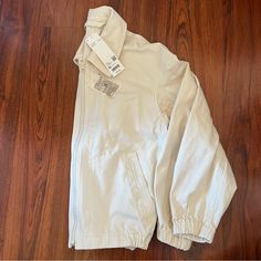 Uniqlo Zip Up Blouson In The Color Off White. Unisex, Size Xs. Brand New With Tag. Casual Uniqlo Outerwear With Pockets, Casual Cream Cotton Outerwear, Casual Fitted Cream Outerwear, Uniqlo Jackets, Uniqlo Women, Uniqlo, Zip Ups, Color White, Jackets & Coats