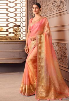 Organza Saree with blouse in Peach colour 1205A Desc: Color : Peach Fabric : Organza Silk Work : Embroidery Wash Care : Dry clean Sleeve Style : Half Sleeve Long Sleeves : Done only in Custom Stitch Sleeves Lining : Done only in Custom Stitch Bust Size : 32 to 42 Inches Occasion : Temple Wear Social Gathering Pongal Gudi Padwa Onam Ugadi. With Express Free Shipping Buy Indian Party wedding wear Bridal Sarees Organza Saree with blouse in Peach colour 1205A online in USA, UK and Canada from KollyB Luxury Semi-stitched Peach Saree, Luxury Peach Saree With Dupatta, Luxury Peach Saree Dress, Luxury Peach Saree For Festive Occasions, Luxury Peach Bollywood Saree, Luxury Peach Saree, Luxury Elegant Peach Saree, Luxury Festive Peach Saree, Luxury Peach Saree With Pallu Detail