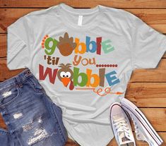 a t - shirt with the words gobble it's wobble on it