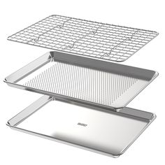 two metal trays stacked on top of each other, one with a grid in the middle