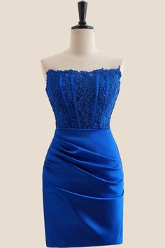 With a stunning royal blue color, bodycon silhouette, and elegant corset bodice adorned with appliques, you'll be the center of attention. The ruched details and built-in bra add extra support and shape while the zip-up back ensures a perfect fit. And at above knee length, this dress is perfect for any occasion. 

Satin material 

Royal blue color

Bodycon silhouette
Corset bodice with appliques 

Ruched details
Built-in bra
Zip-up back
Above knee length

Care: hand wash only
The model is wearing US Size 2. Blue Formal Corset Dress With Corset Back, Fitted Blue Corset Dress For Prom, Blue Corset Dress With Corset Back For Night Out, Blue Evening Corset Dress With Corset Back, Blue Corset Dress With Sweetheart Neckline For Gala, Evening Blue Corset Back Dress, Blue Fitted Corset Dress With Sweetheart Neckline, Fitted Blue Dress With Boned Bodice, Blue Corset Dress With Boned Bodice