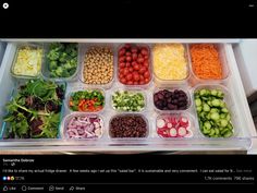 a refrigerator filled with lots of different types of vegetables and veggies in plastic containers