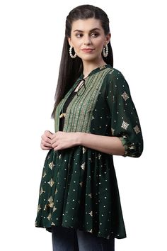 This georgette jacket type tunic is made by ahalyaa. It's look like gujarati kediya that people often wear in navratri night for playing garba. This tunic has broad lace in front for great detailing of tunic. Tunic has malai dori for tie up in front. Pair it with light colour jeggings and gold kohlapuris for that perfect ethnic look. You can wear this tunic as casually or even in party. Sizing tip : please refer to ahalyaa garment size chart n pick a garment size atleast 2" more than your body m Bohemian Green Georgette Choli, Front Open Georgette Dupatta For Eid, Eid Georgette Front Open Dupatta, Eid Front Open Georgette Dupatta, Festive Front Open Georgette Dress, Festive Georgette Straight Kurta Choli, Traditional Georgette Dress With Front Open, Bohemian Georgette Salwar Kameez For Navratri, Diwali Georgette Choli Straight Kurta