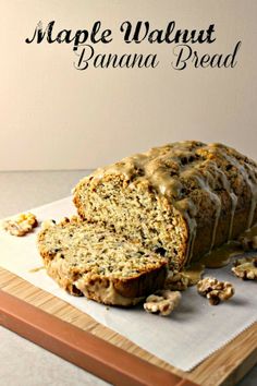 a loaf of maple walnut banana bread on a cutting board