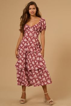 Embrace feminine charm with this puff sleeve floral maxi dress. The tiered skirt and scalloped neckline create a romantic and playful silhouette, perfect for any occasion. Football Dress, Scalloped Neckline, Jean Trends, Altar'd State, Tiered Skirt, Floral Maxi, Dress Romper, Dress With Bow, A Romantic