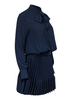 Get ready to turn heads at your next cocktail party with this chic Maje dress! You'll be twirling across the floor in style with precious pleating on the ribbed knit skirt. A playful neck tie completes the look of this gorgeous navy number. Style with neutral pointed-toe pumps for a polished look. Size 4 (Maje 1) Upper 97% Polyester, 3% Elastane Lower 97% Polyamide, 3% Elastane Pullover V-neck w/ neck tie Buttoned cuffs Ribbed knit skirt Pleated skirt Bust 36" Waist (unstretched) 24" Shoulder to hem 37.5" Sleeve length 24"